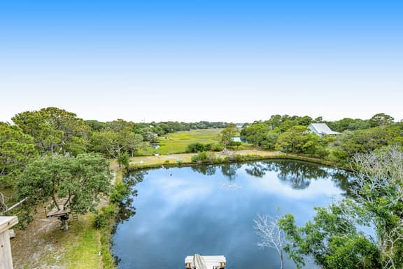 Fantastic coastal retreat with private dock, gas grill, two decks, & fast WiFi