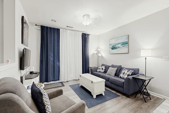 Fully-furnished first-floor condo with pool & private washer/dryer- dog-friendly