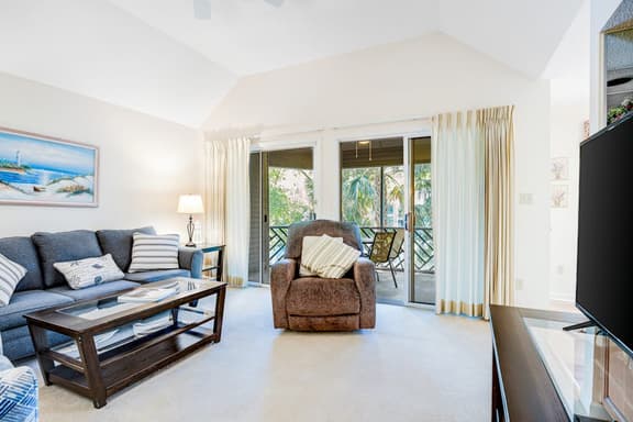 Lagoon view, second floor villa w/ screened in porch, short walk to the beach