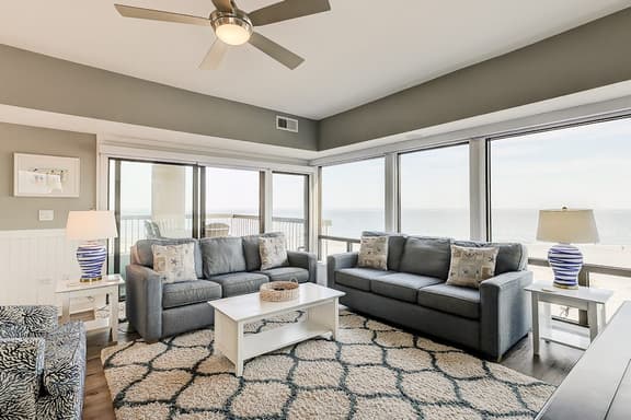 Oceanfront condo on the beach with shared pool, hot tub, & gorgeous decor