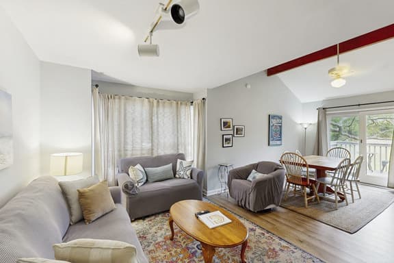 Riverfront condo w/ shared pool plus access to tennis & gym