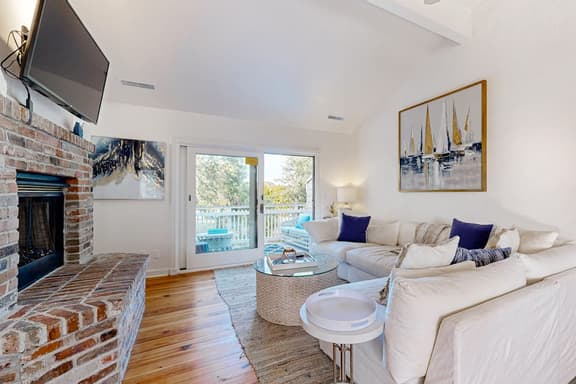 Updated townhouse with outside deck, shared pool, tennis, pickleball and beach